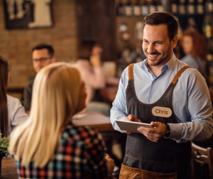 waiter wearing name tag